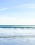 An abstract and serene ocean scape with blue and white hues taken at Nantasket beach in Hull