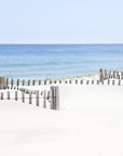 This artwork titled "beach days," featuring a serene and idyllic beach scene from Nauset Beach, Cape Cod. The artwork displays a wide sandy beach leading up to a wooden fence that borders the ocean.