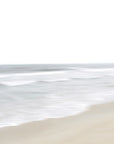 Abstract beach scene with white sand and water meeting at the shoreline