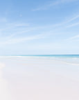 Beach scene in Harbour Island with clear blue sky and ocean