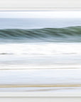 Framed art of abstract ocean wave with green and white lines