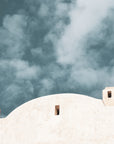 A monastery in stucco under a mysterious blue sky with clouds taken at Monastero Santa Rosa on the Amalfi Coast Italy