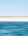 This image presents an abstract artwork titled "Cape Summer," featuring a serene and minimalist beach scene. The artwork captures the tranquil waters of the ocean meeting the soft, sandy shores under a clear blue sky.