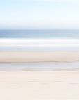 This image presents a fine art photograph titled "Keep Going," featuring a serene beach scene in Orleans, Cape Cod. The artwork captures a minimalist landscape, showcasing the subtle textures of the beach sand and the gentle gradient of the ocean meeting the sky.