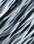This image presents an abstract artwork titled "Silk," featuring a close-up view of the water showing great texture.