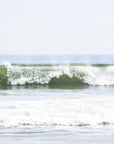 This image captures a serene and powerful ocean scene at Nauset Beach in Orleans, Cape Cod. The artwork features a.