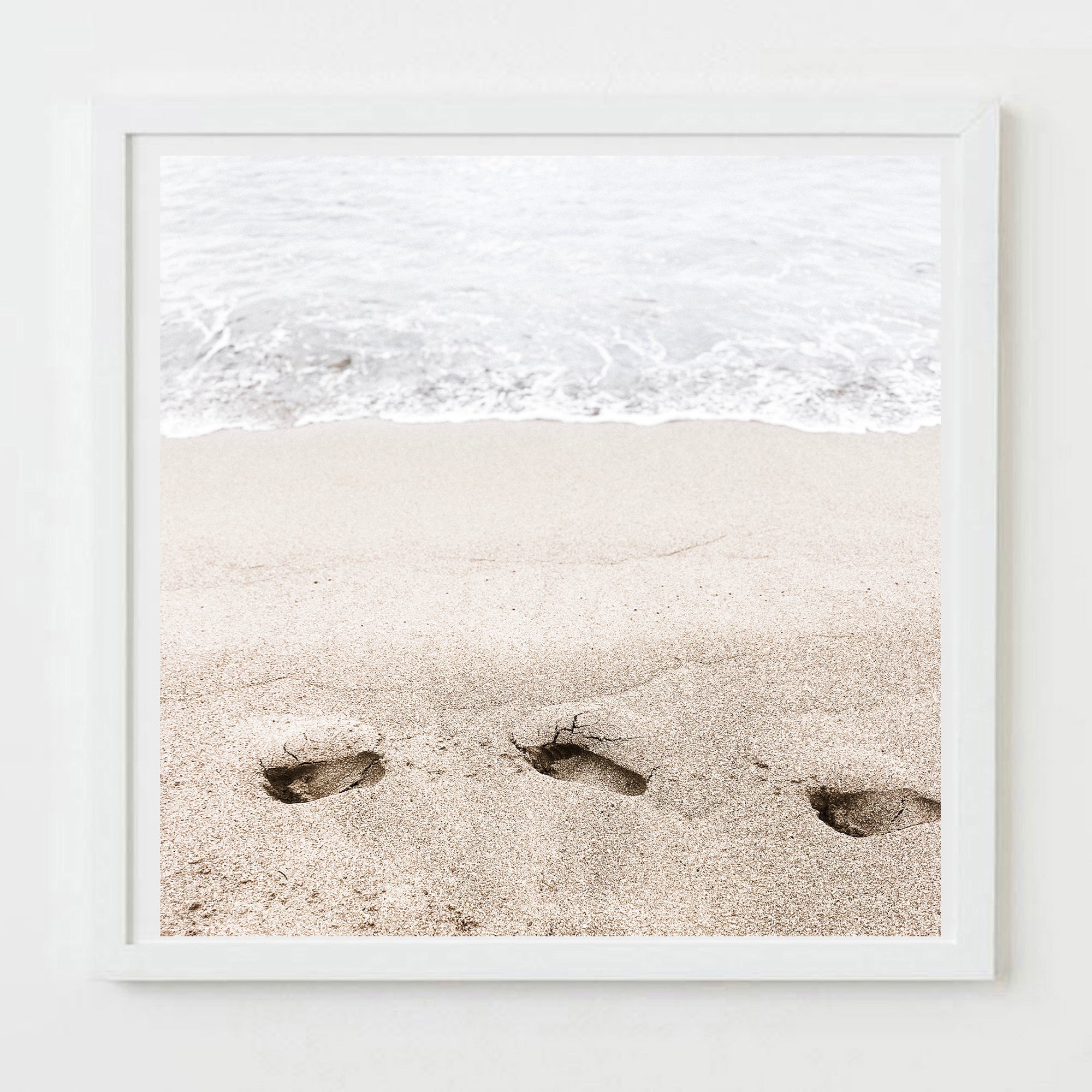 footprints on the beach photograph by Sarah Dasco