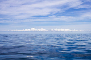 blue waters and clouds on the nantucket sound photograph by Sarah Dasco