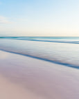 Abstract beach scene with blurred pink sand and turquoise water on Harbour Island