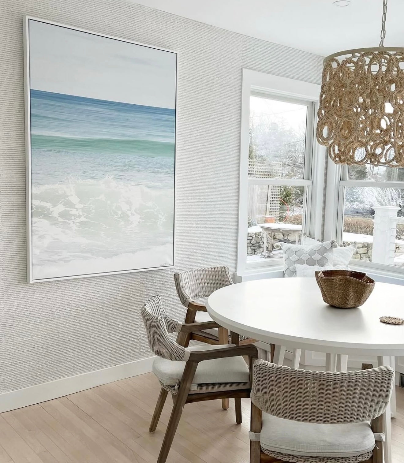 Shades of Blue displayed as a framed vertical canvas in coastal inspired home