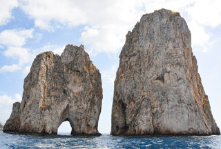 Famous rock formations of Faraglioni, Capri, Italy by Sarah Dasco